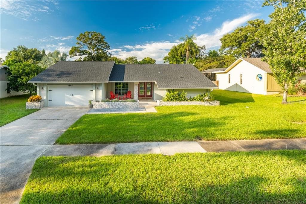 1441 TREETOP DRIVE PALM HARBOR, FL 34683