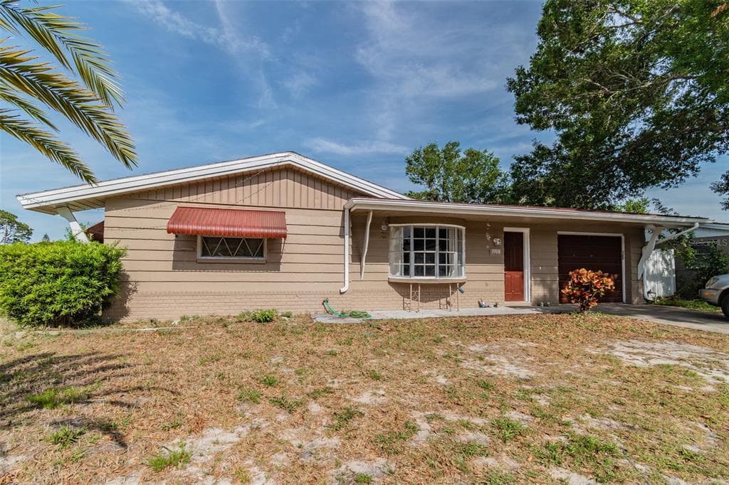 3308 WILLIAMSBURG LOOP HOLIDAY, FL 34691