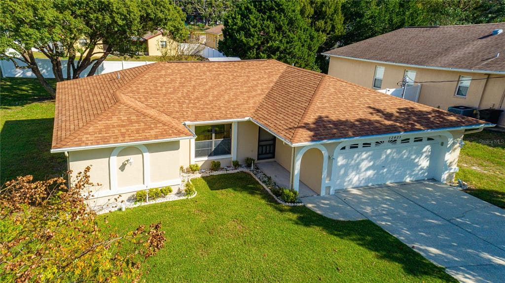 12423 SPREADING OAK DRIVE
