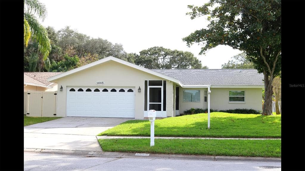 1665 AMBERLEA DRIVE S DUNEDIN, FL 34698