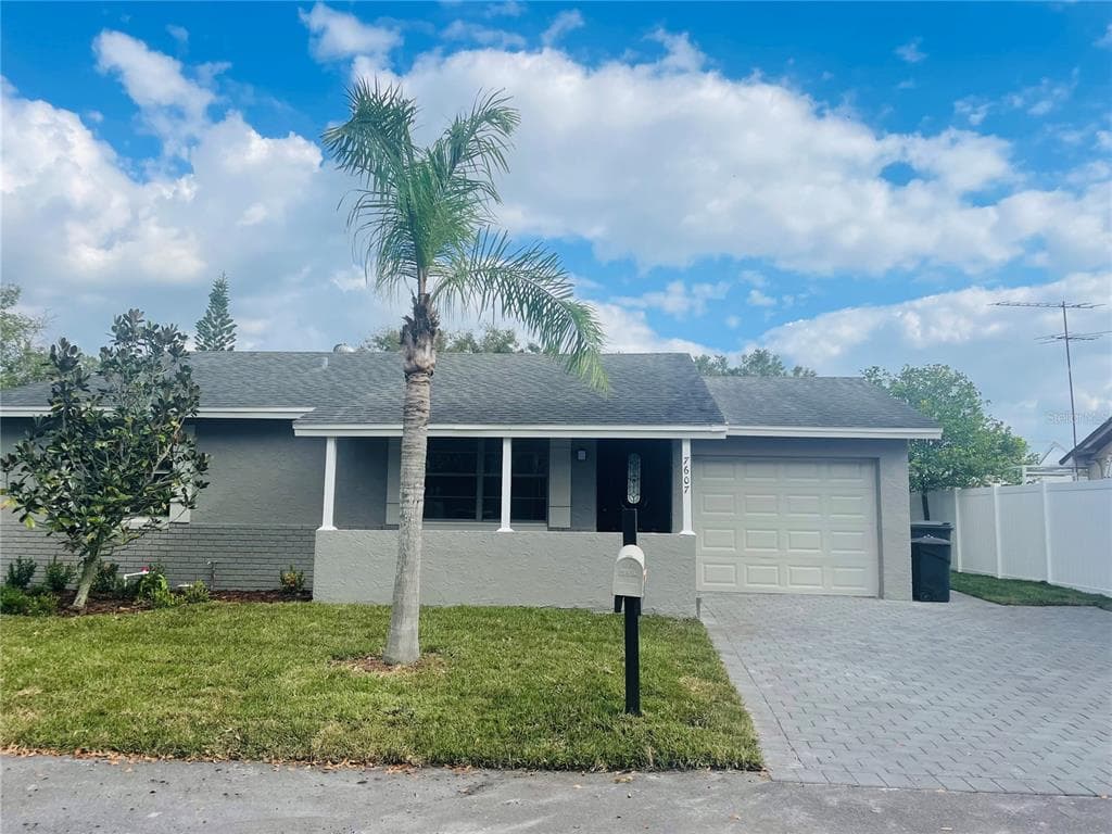 7607 WOODLAND OAKS COURT