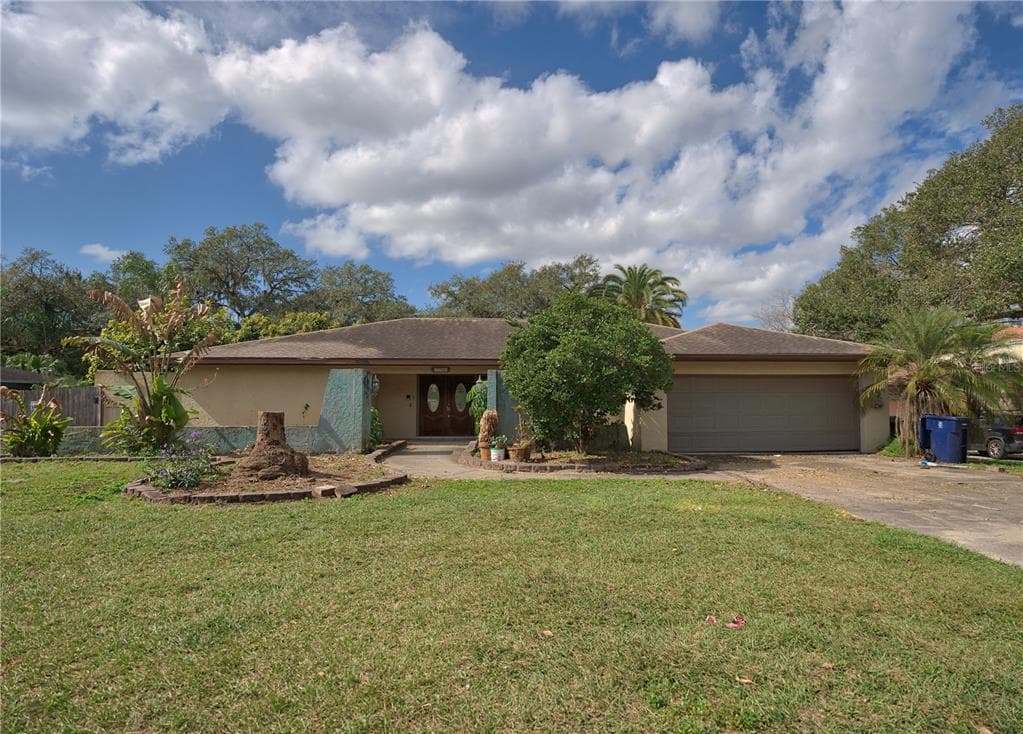 7706 N OLA AVENUE TAMPA, FL 33604