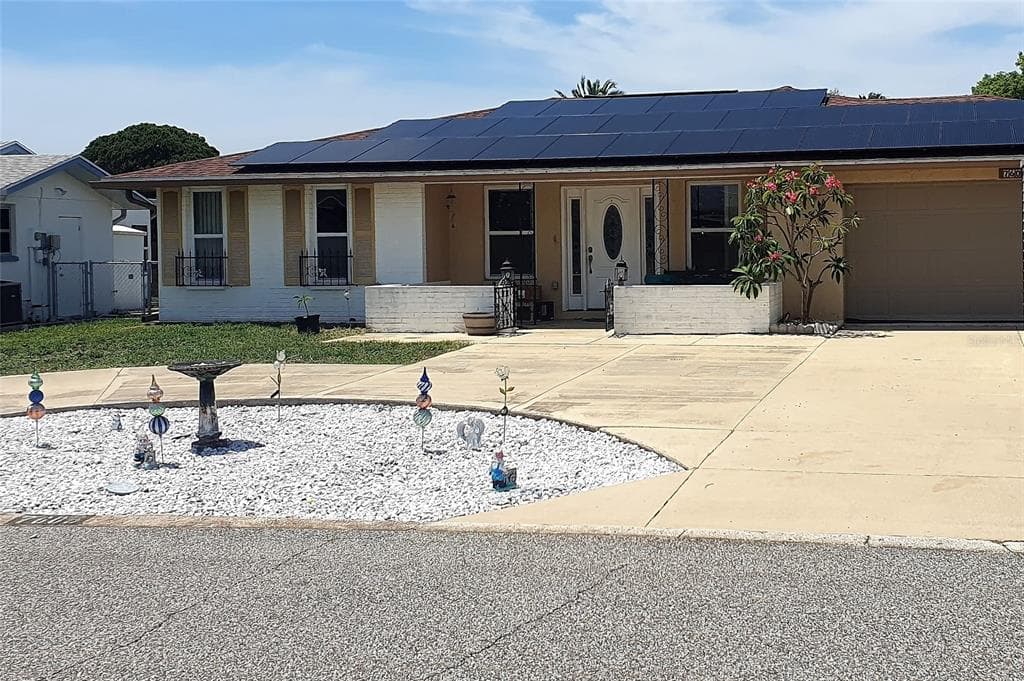 7605 BERGAMOT DRIVE PORT RICHEY, FL 34668