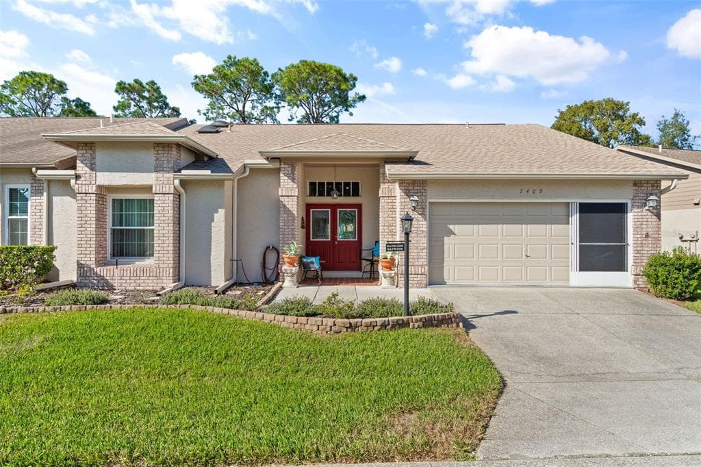 7409 MEADOW BROOK LANE SPRING HILL, FL 34606