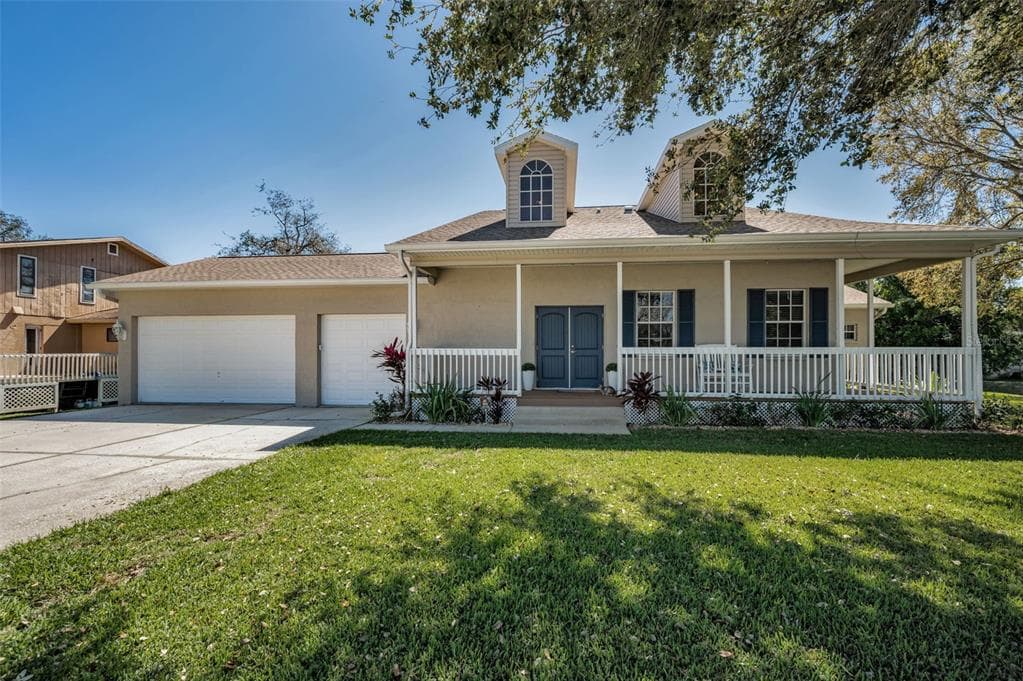 1028 ROSETREE LANE TARPON SPRINGS, FL 34689