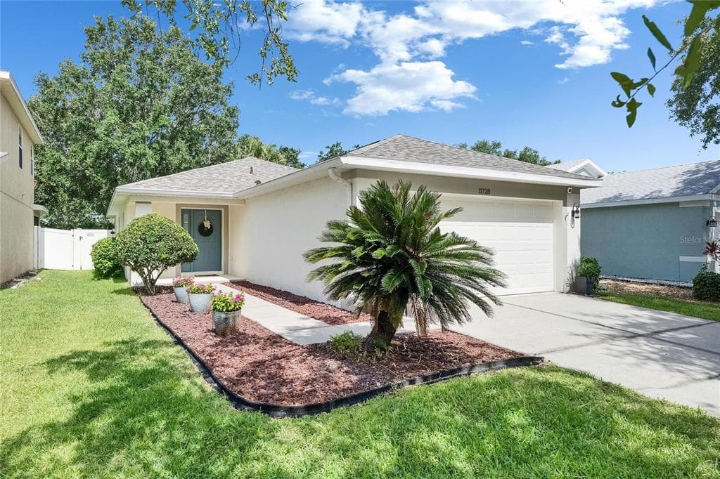 11728 CREST CREEK DRIVE