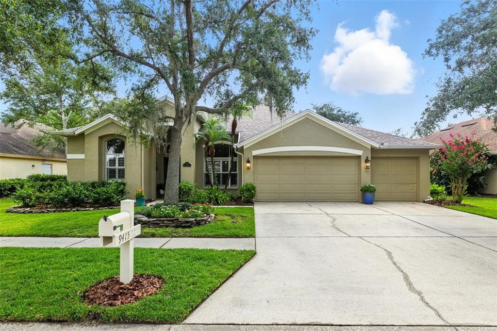 9415 HUNTERS POND DRIVE