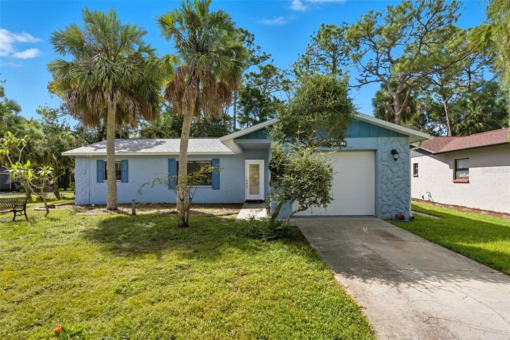6936 DRIFTWOOD DRIVE