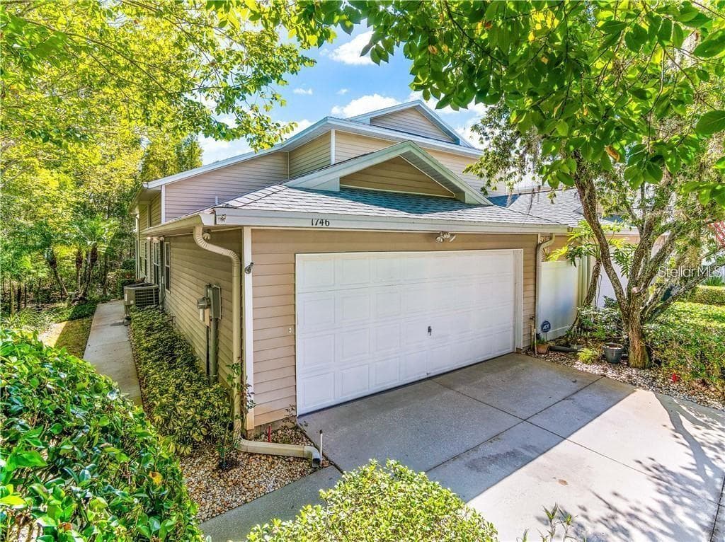 1746 HERON COVE DRIVE LUTZ, FL 33549