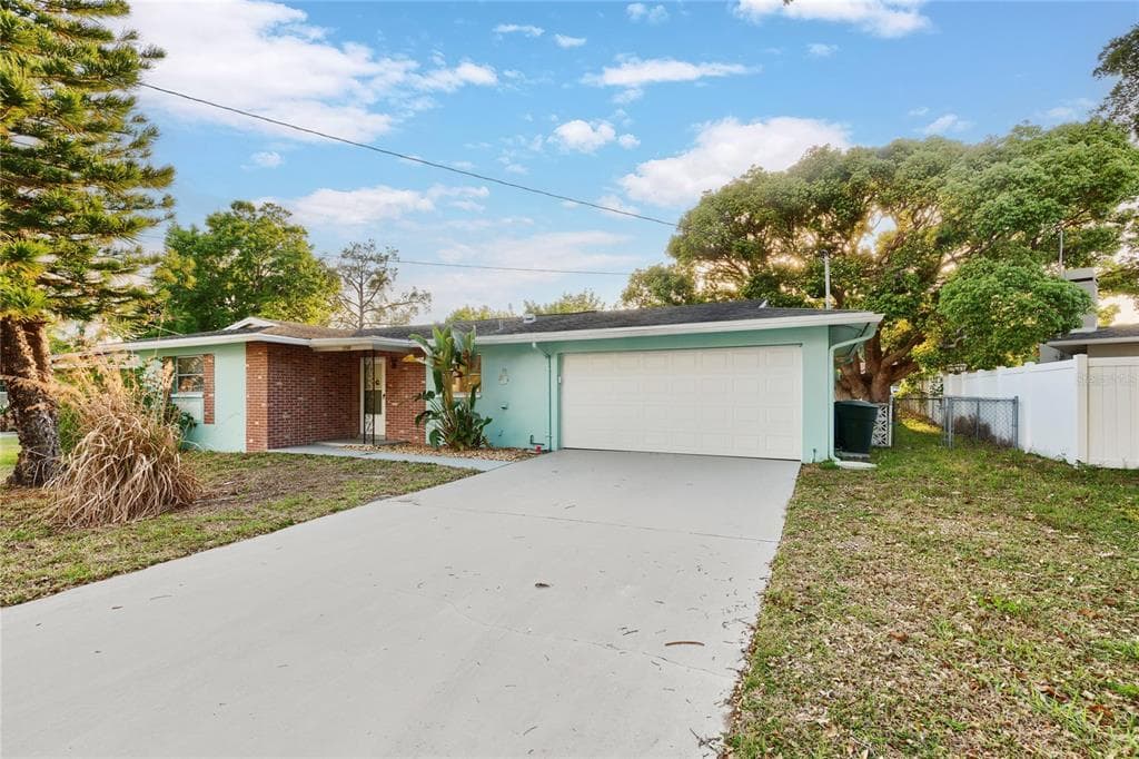 1248 LAZY LAKE ROAD W DUNEDIN, FL 34698