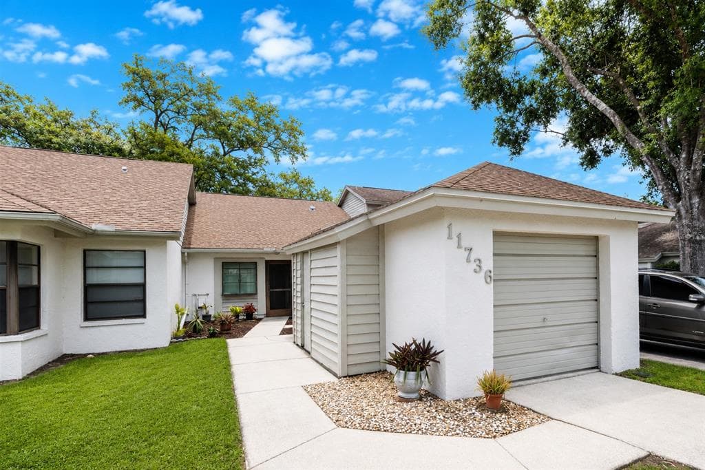 11736 ROLLING PINE LANE PORT RICHEY, FL 34668
