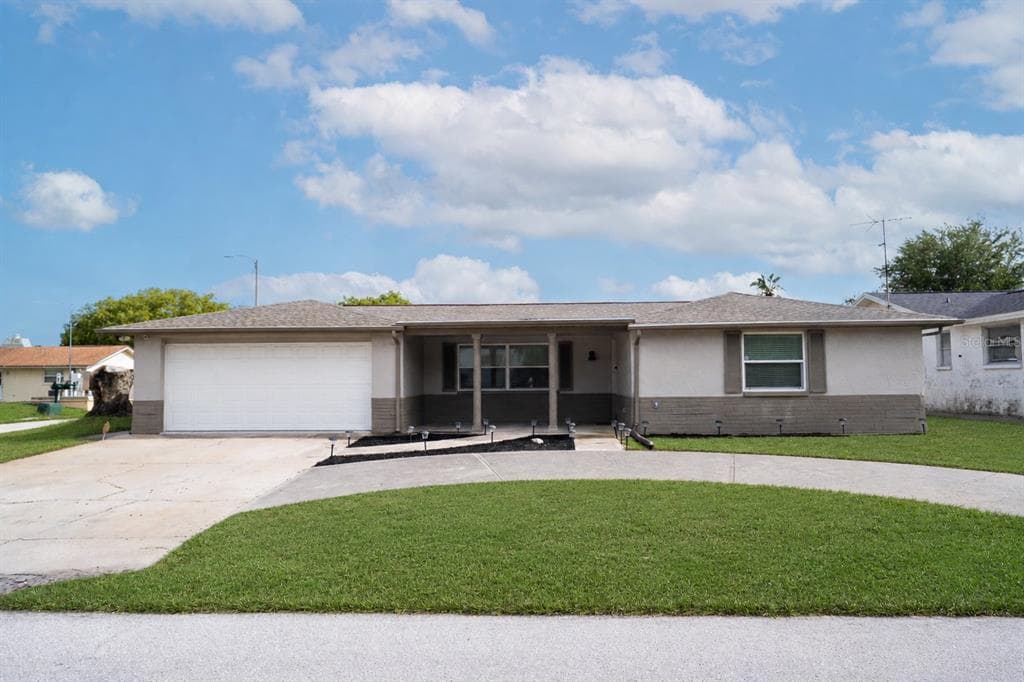 7715 FOXBLOOM DRIVE PORT RICHEY, FL 34668