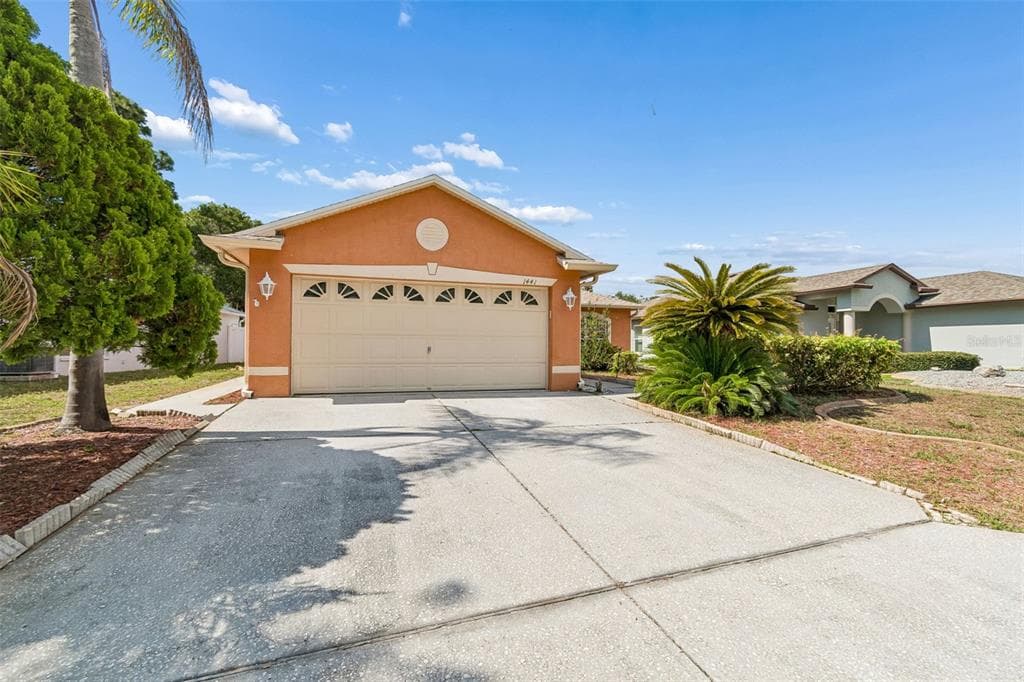 1441 WATERMILL CIRCLE TARPON SPRINGS, FL 34689
