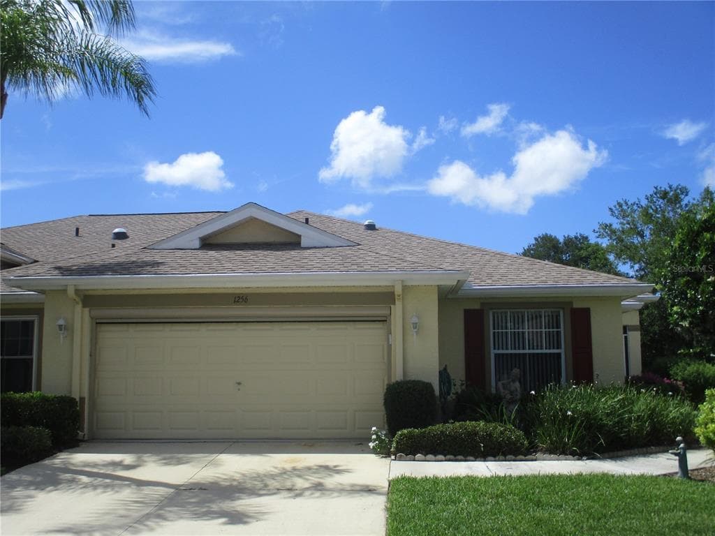 1256 CORINTH GREENS DRIVE SUN CITY CENTER, FL 33573
