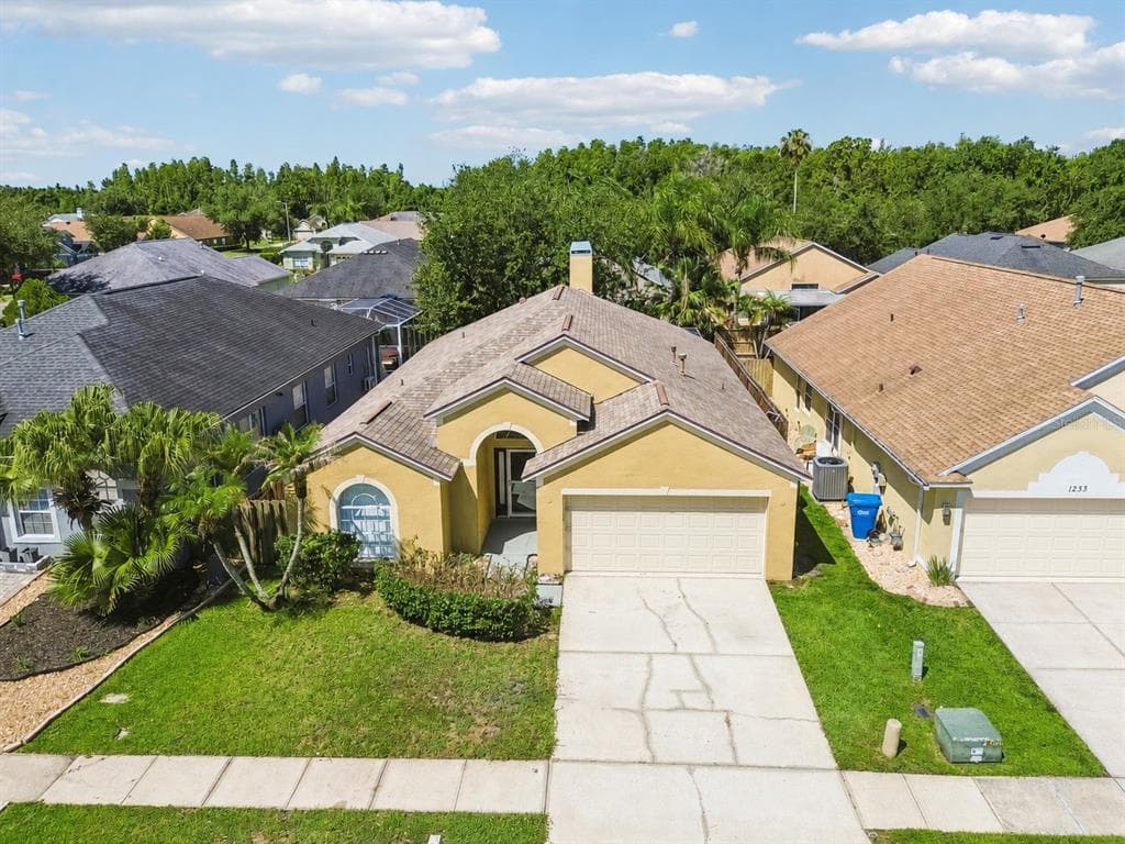1229 CRIMSON CLOVER LANE WESLEY CHAPEL, FL 33543