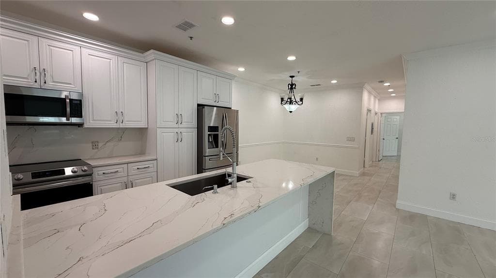 16303 ENCLAVE VILLAGE DRIVE UNIT 103 TAMPA, FL 33647