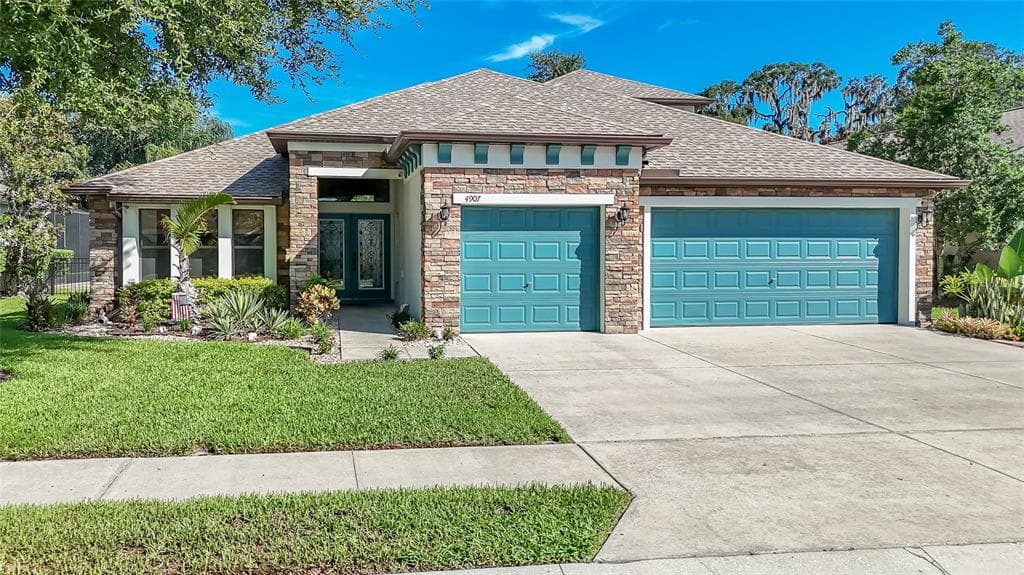 4907 POINTE O WOODS DRIVE