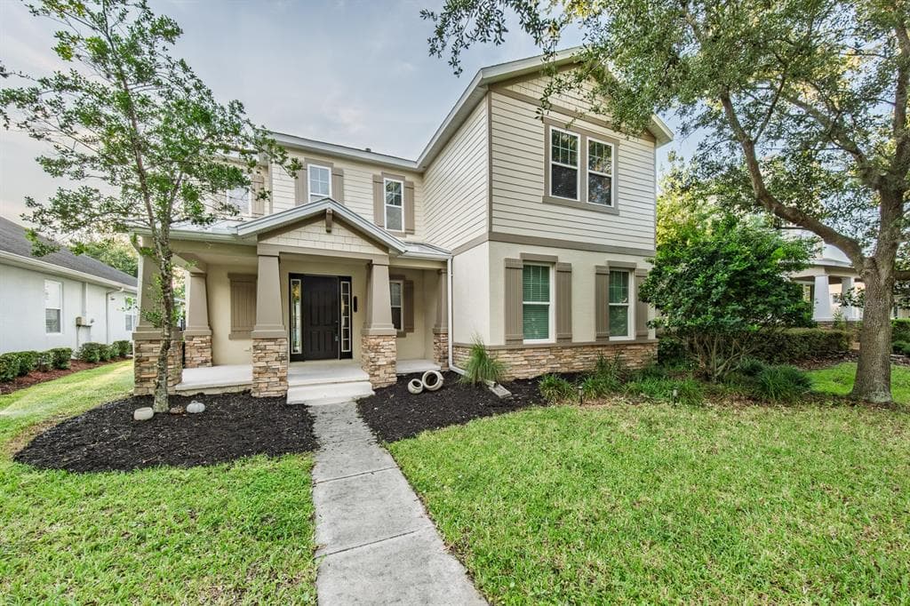 7912 HAMPTON LAKE DRIVE TAMPA, FL 33647