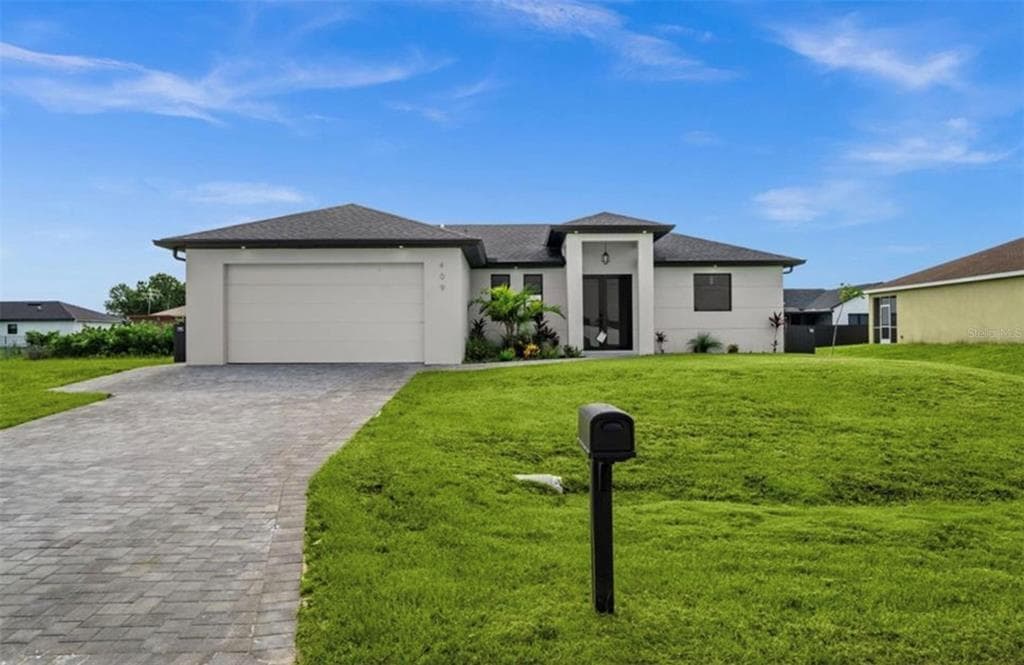 409 NW 25TH PLACE CAPE CORAL, FL 33993