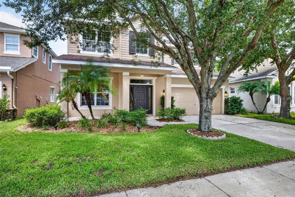 7906 CAMDEN WOODS DRIVE TAMPA, FL 33619