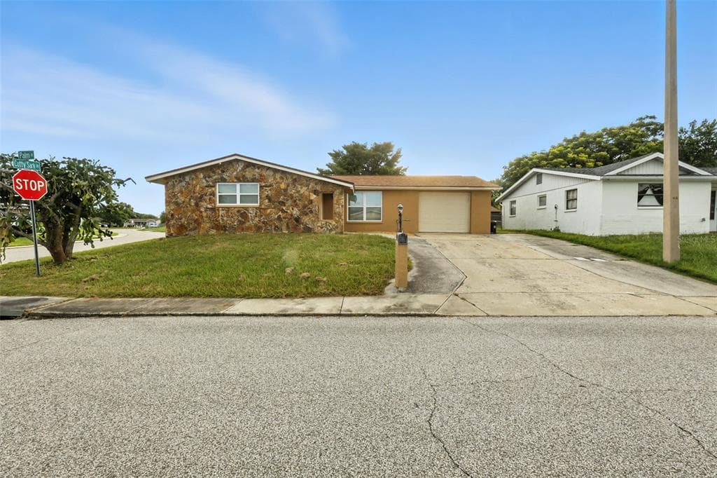 9239 PALM AVENUE PORT RICHEY, FL 34668