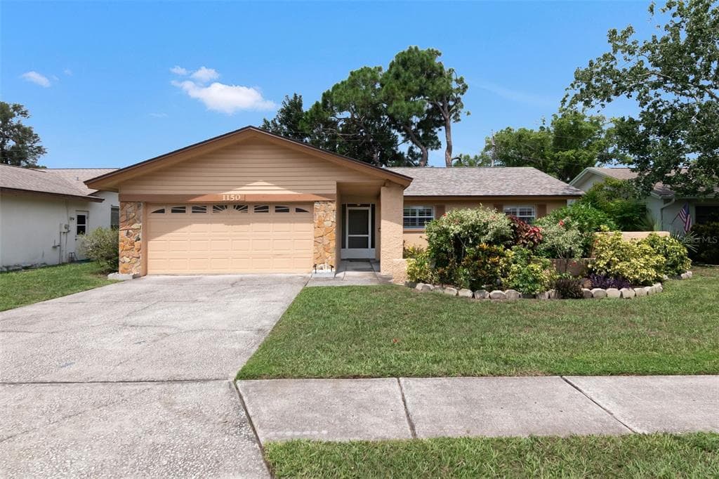 1150 BROOK DRIVE W DUNEDIN, FL 34698