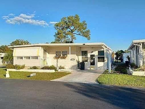 7880 54TH AVENUE N UNIT 106 ST PETERSBURG, FL 33709