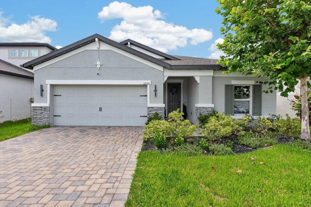22310 WOODMEN HALL DRIVE LAND O LAKES, FL 34637