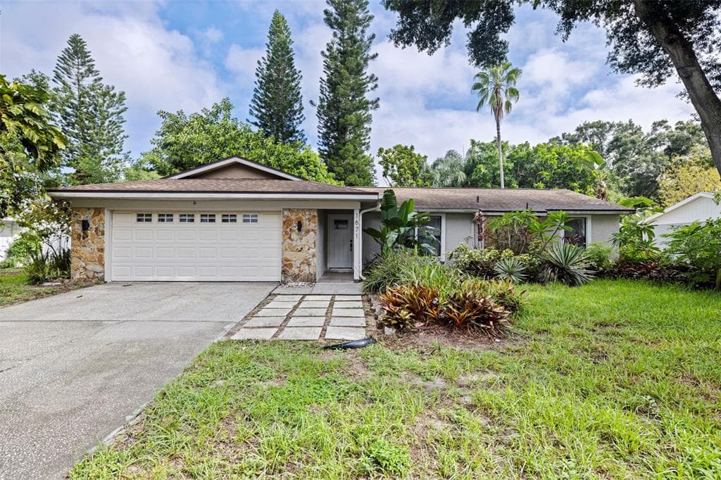 1671 CASTLEWOOD LANE PALM HARBOR, FL 34683