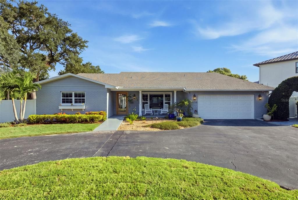 10715 CARROLLWOOD DRIVE TAMPA, FL 33618