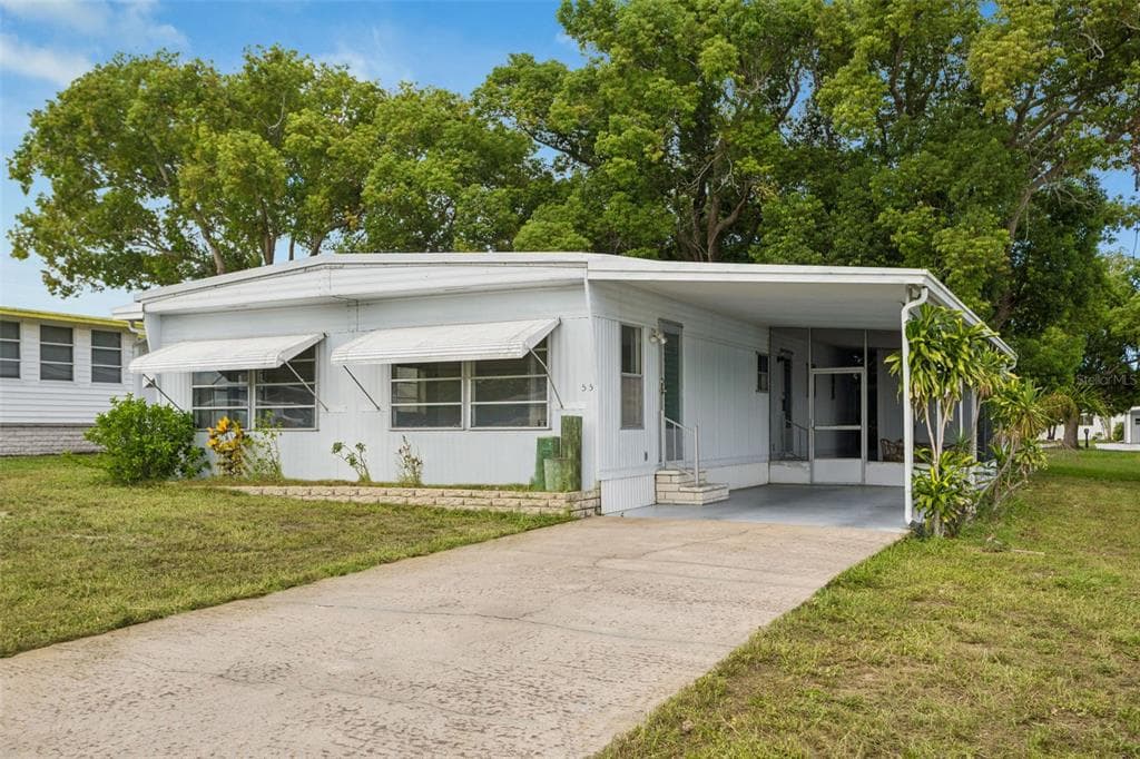 55 LEXINGTON COURT UNIT 12 PALM HARBOR, FL 34684