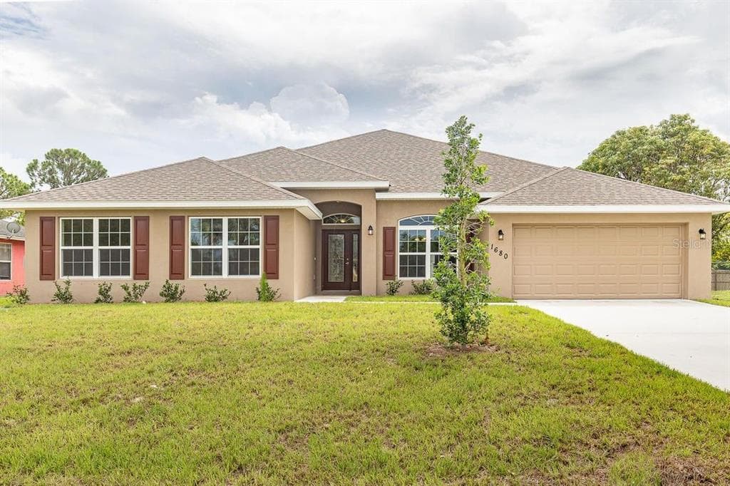 216 LAGOON MIST CT. OAK HILL, FL 32759