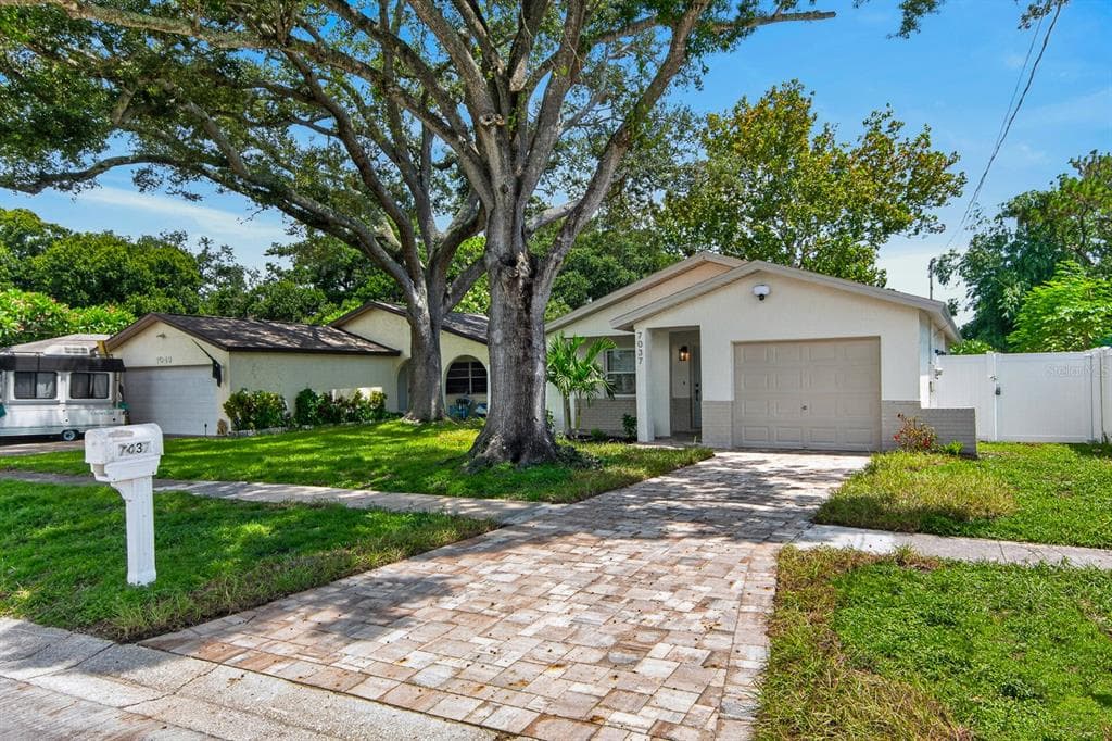 7037 69TH STREET N